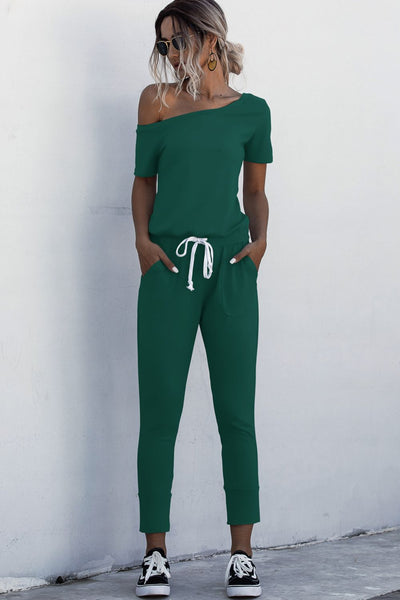 Asymmetrical Neck Tied Jumpsuit with Pockets - SHE BADDY© ONLINE WOMEN FASHION & CLOTHING STORE