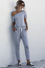 Asymmetrical Neck Tied Jumpsuit with Pockets - SHE BADDY© ONLINE WOMEN FASHION & CLOTHING STORE