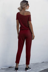 Asymmetrical Neck Tied Jumpsuit with Pockets - SHE BADDY© ONLINE WOMEN FASHION & CLOTHING STORE