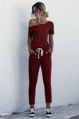 Asymmetrical Neck Tied Jumpsuit with Pockets - SHE BADDY© ONLINE WOMEN FASHION & CLOTHING STORE